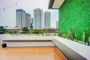 Balkón nebo terasa v ubytování SUPER OYO 93064 Alhesa Residence