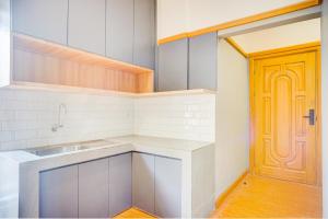 Kuchyň nebo kuchyňský kout v ubytování SUPER OYO 93064 Alhesa Residence