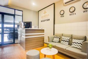 Kuchyň nebo kuchyňský kout v ubytování SUPER OYO 93064 Alhesa Residence