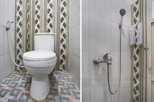 Vannituba majutusasutuses OYO D'lima Guest House Sub