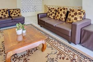 Χώρος καθιστικού στο OYO 91707 Jannah Homestay Syariah