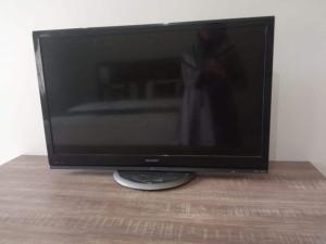 TV a/nebo společenská místnost v ubytování Hotel O Ananda Homestay Syariah + 20 fotografií