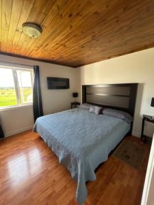 Voodi või voodid majutusasutuse PEI Cottage Rental toas