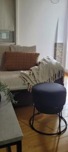 A bed or beds in a room at Apartman Riva
