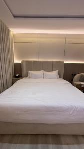 Katil atau katil-katil dalam bilik di Private Studio Smart Entry Hotel System