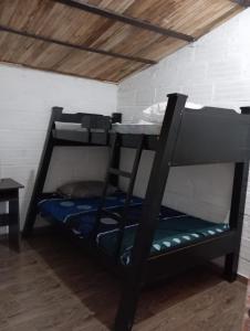 Katil atau katil-katil dalam bilik di Hostal otro cuento