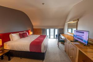Телевизор и/или развлекательный центр в The Perisher Valley Hotel