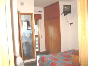 Postel nebo postele na pokoji v ubytování Albergo Tirolo