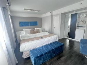 Rúm í herbergi á Flat Hotel Moema Ibirapuera