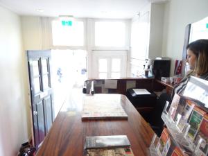 a woman sitting at a desk in an office at Hotel Park Plantage in Amsterdam +46 photos