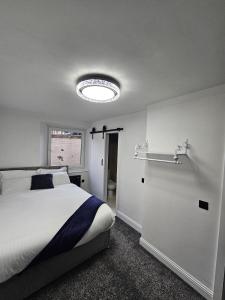 Postel nebo postele na pokoji v ubytování Central Hotel Edinburgh