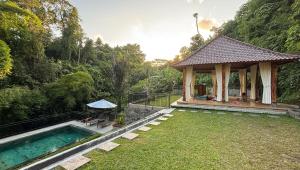 Πισίνα στο ή κοντά στο Dur Pekerisan Retreat Villa Ubud