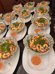a group of plates of food on a table at An Thái Hotel in Kon Tum +20 photos