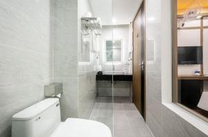 Koupelna v ubytování A25 Hotel - 21 Nghia Tan