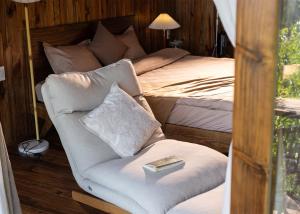 Postel nebo postele na pokoji v ubytování KỲ VIÊN Home & Cafe