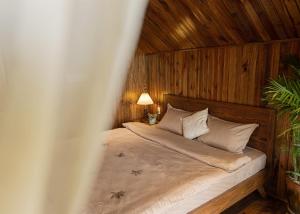 Postel nebo postele na pokoji v ubytování KỲ VIÊN Home & Cafe