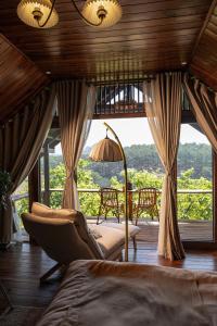 Posezení v ubytování KỲ VIÊN Home & Cafe + 37 fotografií