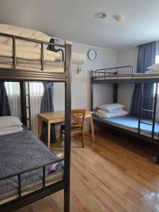 Postel nebo postele na pokoji v ubytování Appletree Hotel Pohang