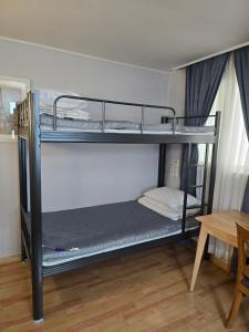Postel nebo postele na pokoji v ubytování Appletree Hotel Pohang