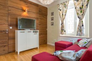 Телевизор и/или развлекательный центр в Apartments Petra