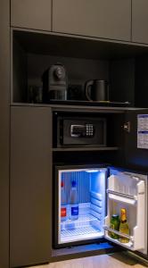 MH SUITES Plebiscito的厨房或小厨房