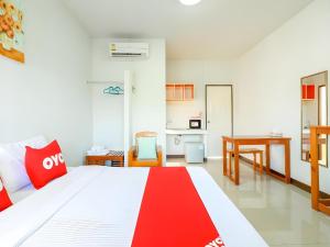 Dnk Baan Suan客房内的一张或多张床位