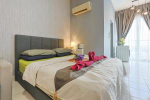 Postel nebo postele na pokoji v ubytování 5mins to Sunway Pyramid #Subang SS15 Cozy Studio Menara Rajawali