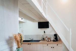 Kuchyň nebo kuchyňský kout v ubytování Logement en rez-de-chaussée