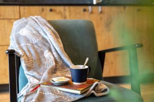 Posezení v ubytování Hello Zeeland - Vakantiewoning Middelburgseweg 4