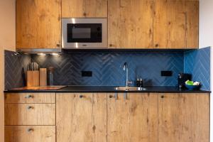 Kuchyň nebo kuchyňský kout v ubytování Hello Zeeland - Vakantiewoning Middelburgseweg 4