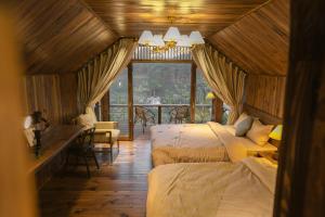 Postel nebo postele na pokoji v ubytování KỲ VIÊN Home & Cafe