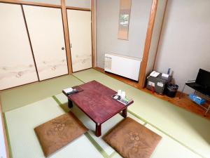 国民宿舎古岩屋荘的电视和/或娱乐中心