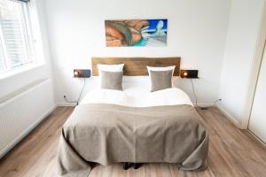 Postel nebo postele na pokoji v ubytování Hotel Marina