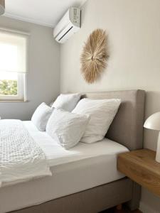Letto o letti in una camera di Zentral I Business I Boxspring I Klima I Parkplatz