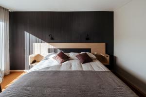 Cosmopolite Hotel Nieuwpoort-Badにあるベッド