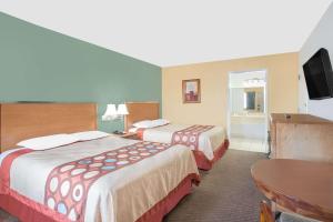 Voodi või voodid majutusasutuse Super 8 by Wyndham St. George UT toas