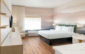 Voodi või voodid majutusasutuse DoubleTree by Hilton Phoenix-Gilbert toas