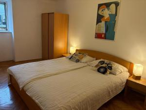 Ein Bett oder Betten in einem Zimmer der Unterkunft Stone Apartment Primosten