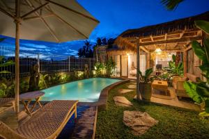 Piscina di The Macaw Ubud Green Uma Villa o nelle vicinanze