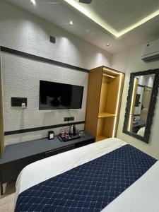 Divine Hotel客房内的一张或多张床位