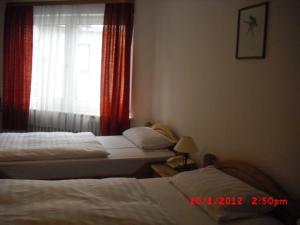 Postel nebo postele na pokoji v ubytování Hotel Feilen-Wolff