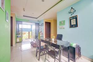 Posezení v ubytování Hotel O Tebet Near Tebet Station Formerly Sabda Guest House