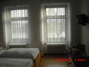 Postel nebo postele na pokoji v ubytování Hotel Feilen-Wolff