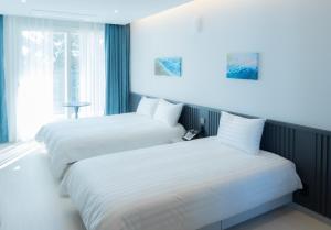 Hotel Sollavue客房内的一张或多张床位