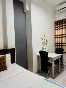 Postel nebo postele na pokoji v ubytování Home Living Unit