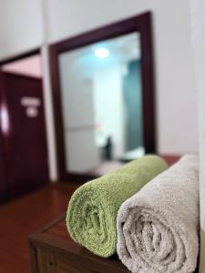 Postel nebo postele na pokoji v ubytování Home Living Unit