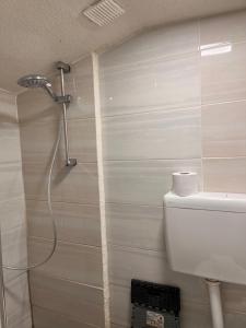 Ein Badezimmer in der Unterkunft Panda Rooms