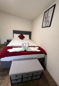 Ein Bett oder Betten in einem Zimmer der Unterkunft Panda Rooms