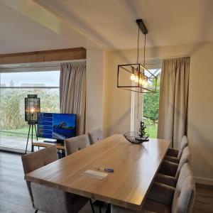 Posezení v ubytování Waterresort Bodelaeke Giethoorn