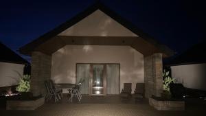 Patio nebo venkovní prostory v ubytování Łeba Park Resort - Domki